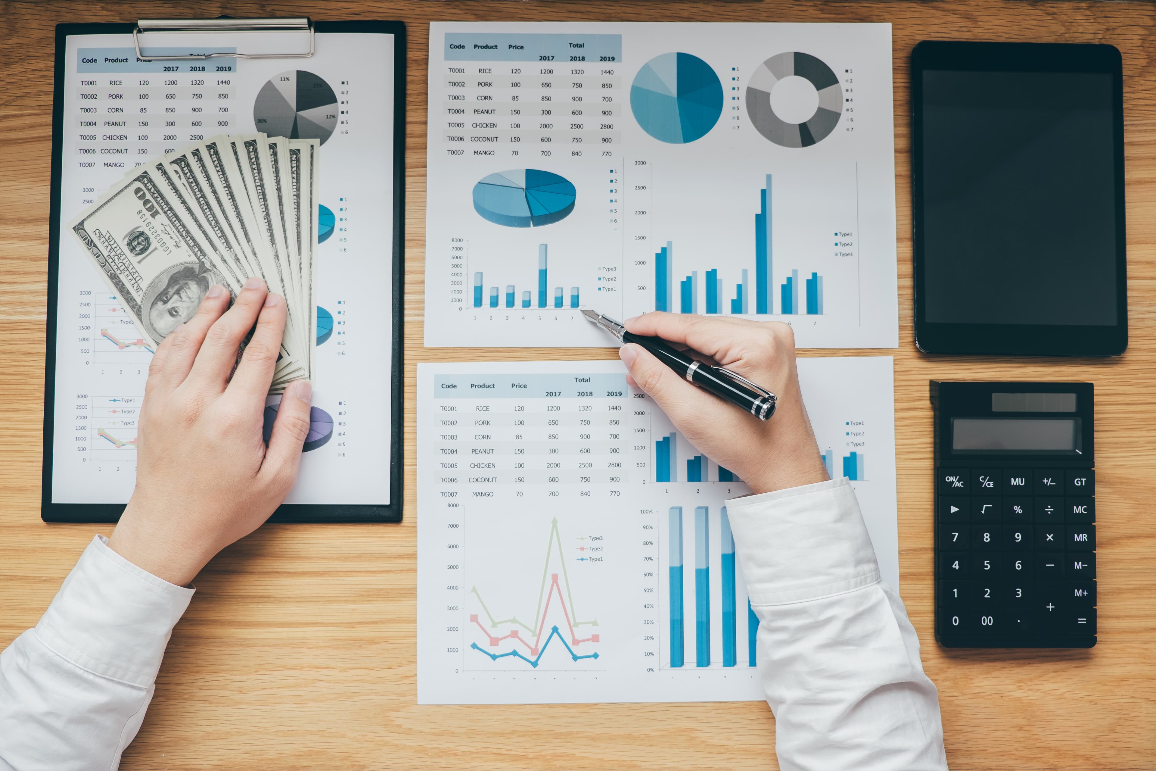 Businessman working on financial graph document