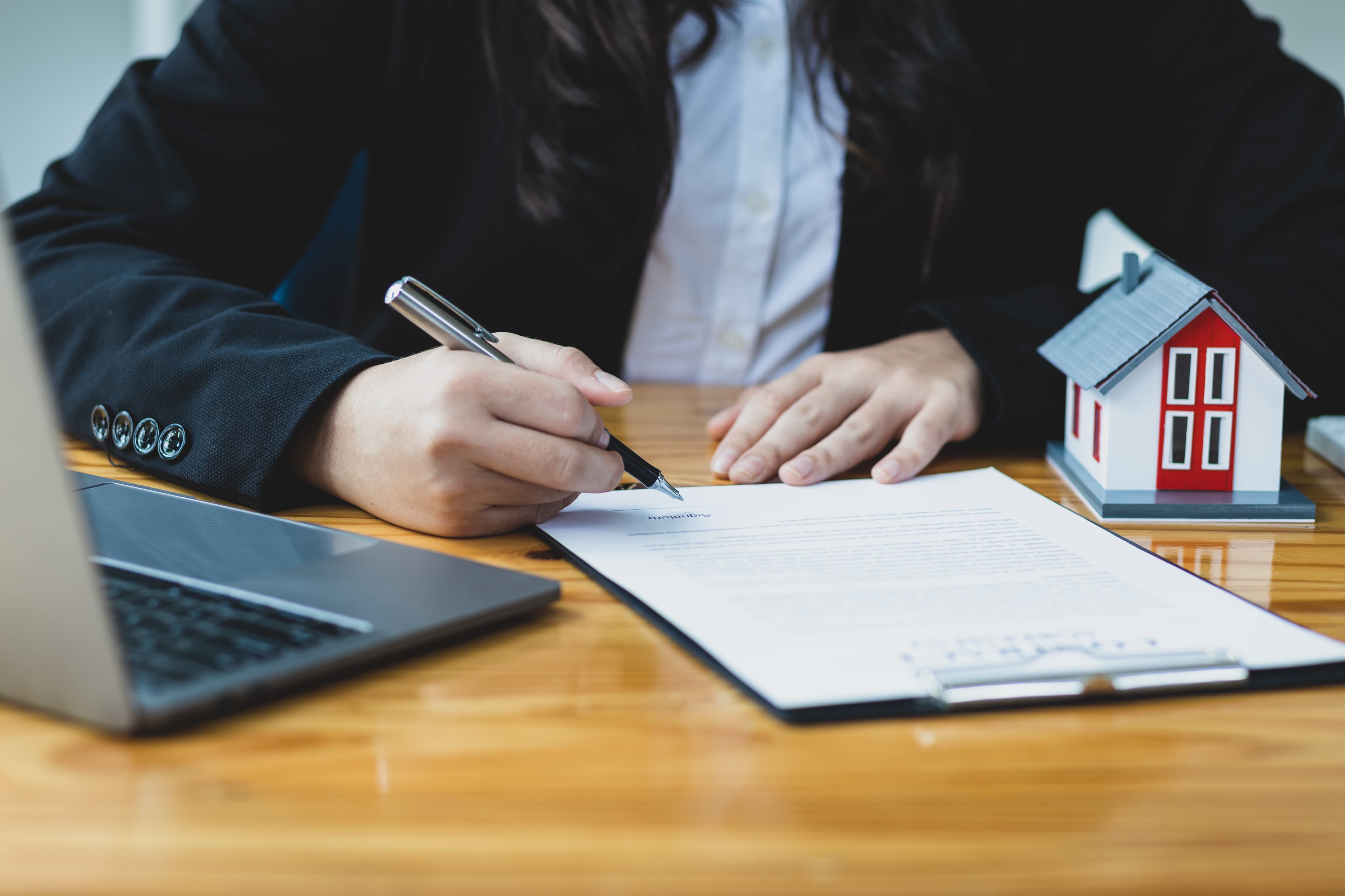 Real estate agent reading documents