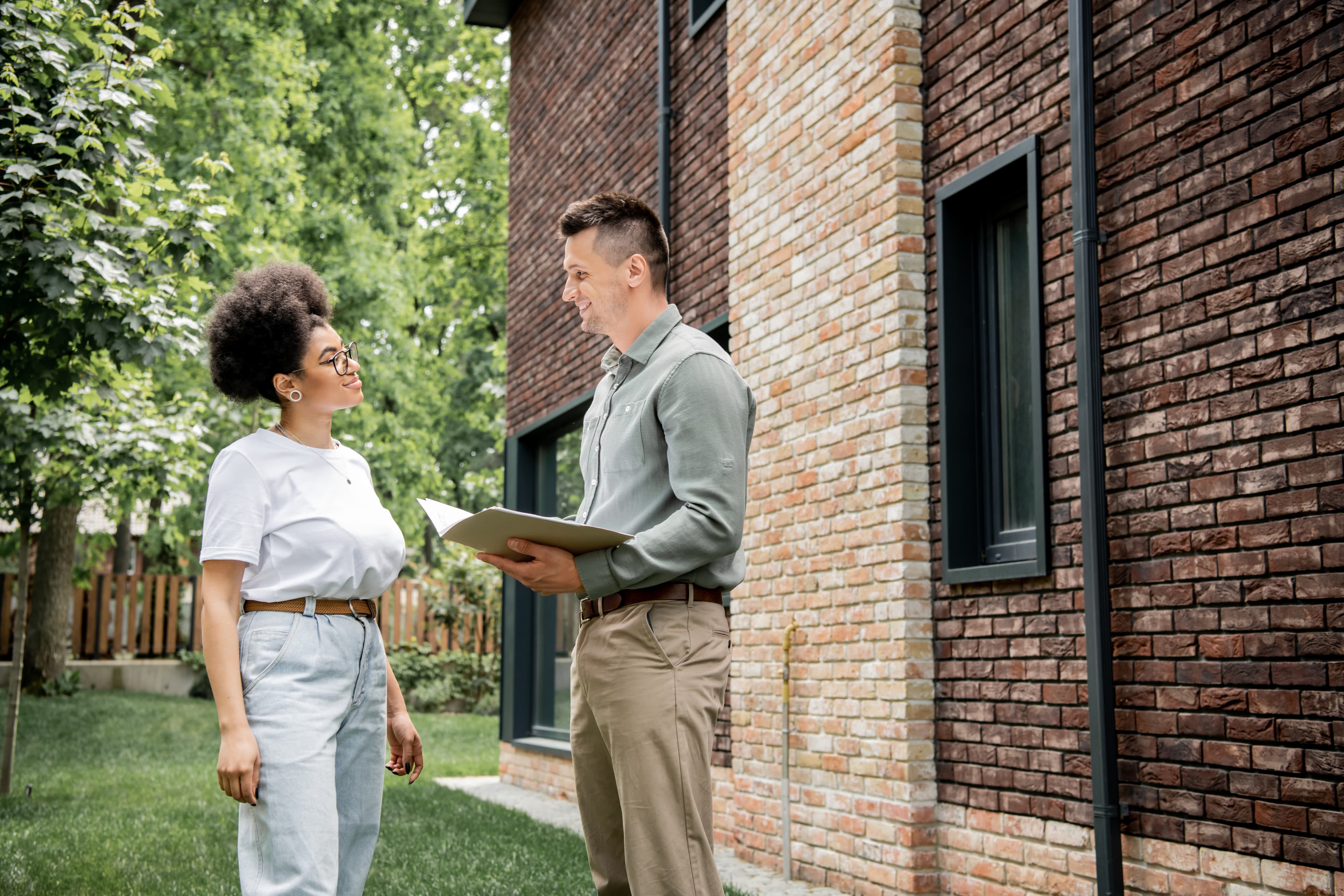 Confident real estate agent discussing property details