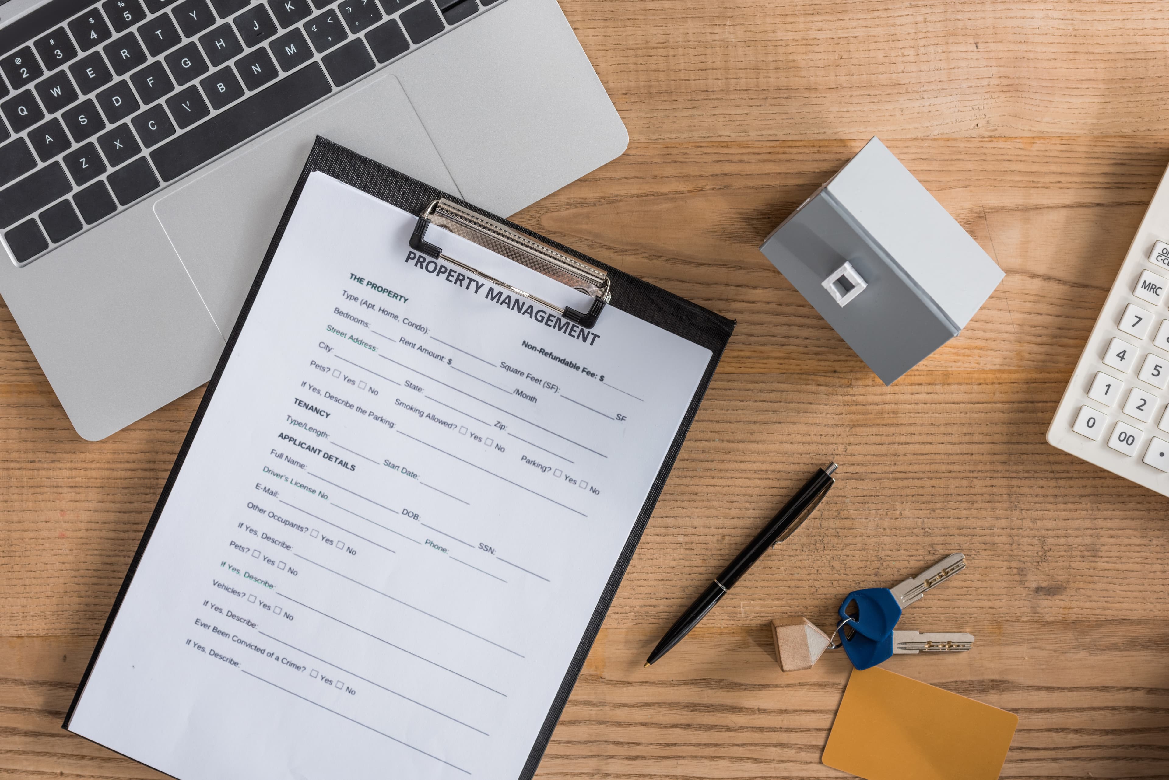Property management agreement on clipboard