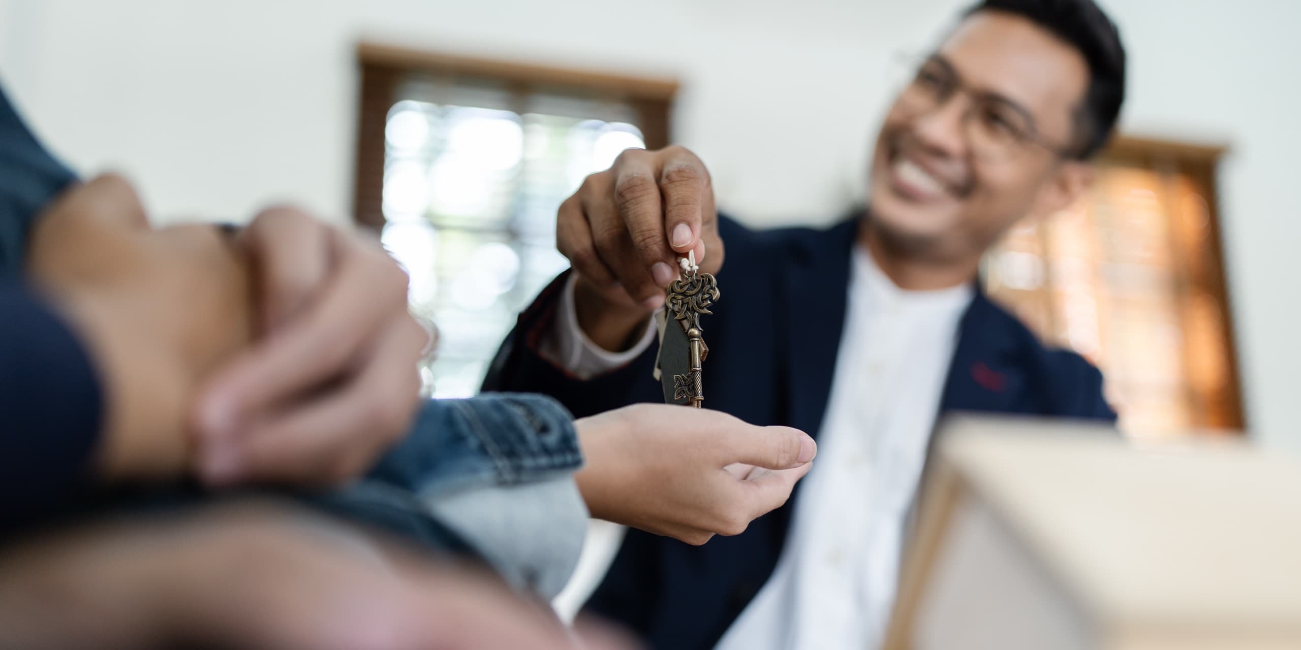 Happy family in their new rental home